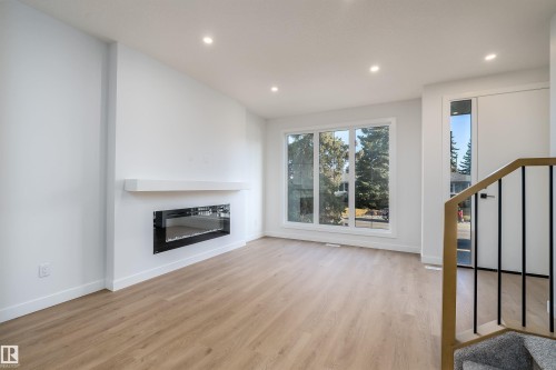 9540 148 Street, Edmonton, AB - Indoor Photo Showing Living Room With Fireplace