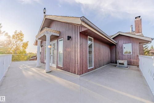 Rear view of house with a chimney - 1602 106 Street, Edmonton, AB - Outdoor With Exterior