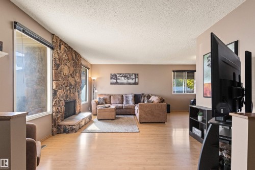 1704 39 Street, Edmonton, AB - Indoor Photo Showing Other Room With Fireplace