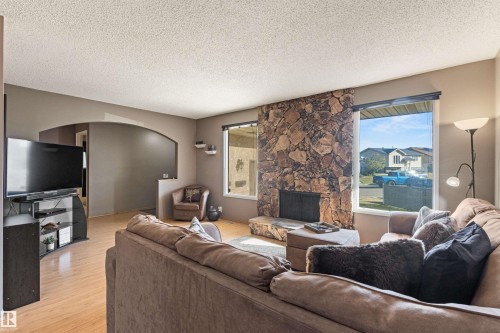 1704 39 Street, Edmonton, AB - Indoor Photo Showing Living Room With Fireplace