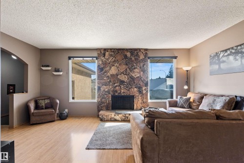 1704 39 Street, Edmonton, AB - Indoor Photo Showing Living Room With Fireplace