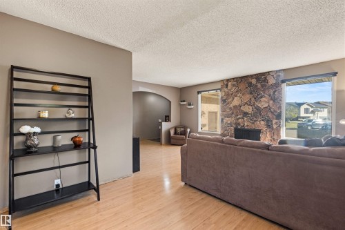 1704 39 Street, Edmonton, AB - Indoor Photo Showing Living Room With Fireplace