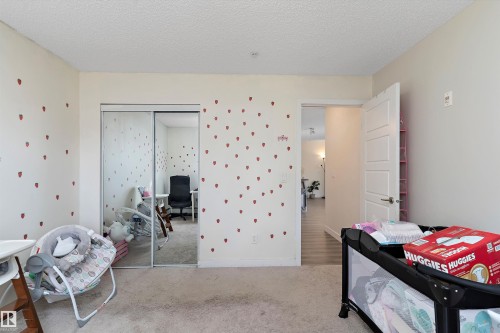110 14808 125 Street, Edmonton, AB - Indoor Photo Showing Bedroom