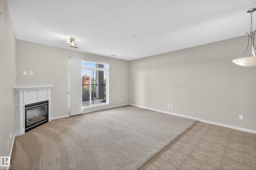 112 2503 Hanna Crescent, Edmonton, AB - Indoor With Fireplace