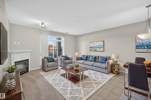 112 2503 Hanna Crescent, Edmonton, AB - Indoor Photo Showing Living Room With Fireplace