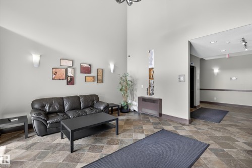 112 2503 Hanna Crescent, Edmonton, AB - Indoor Photo Showing Living Room