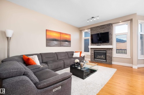 3604 16 Street, Edmonton, AB - Indoor Photo Showing Living Room With Fireplace