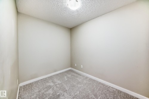 220 14808 125 Street, Edmonton, AB - Indoor Photo Showing Other Room