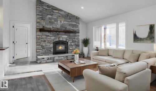 311 55504 Rr 13, Rural Lac Ste. Anne County, AB - Indoor Photo Showing Living Room With Fireplace