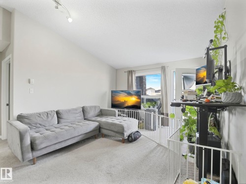 1437 9363 Simpson Drive, Edmonton, AB - Indoor Photo Showing Living Room