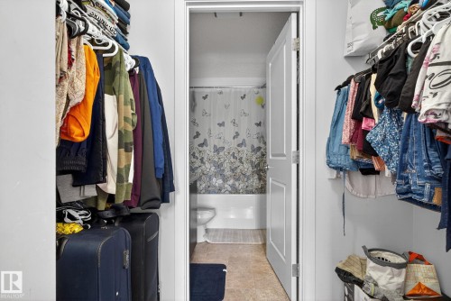 Spacious closet with light tile patterned floors - 209 3353 16A, Edmonton, AB - Indoor With Storage