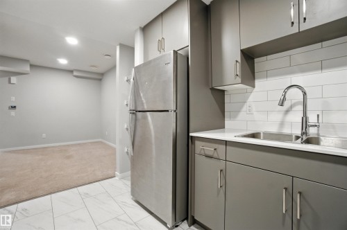 20727 25 Ave Nw, Edmonton, AB - Indoor Photo Showing Kitchen With Double Sink