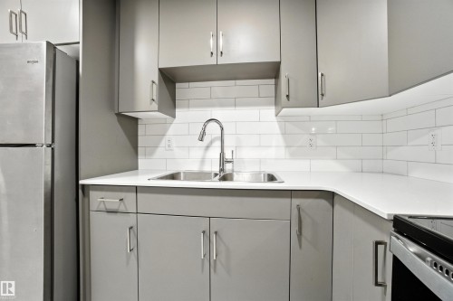 20727 25 Ave Nw, Edmonton, AB - Indoor Photo Showing Kitchen With Double Sink