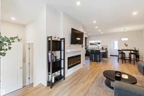 310 Balsam Link, Leduc, AB - Indoor Photo Showing Living Room With Fireplace