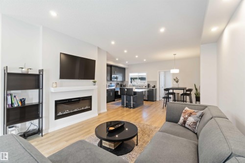 310 Balsam Link, Leduc, AB - Indoor Photo Showing Living Room With Fireplace