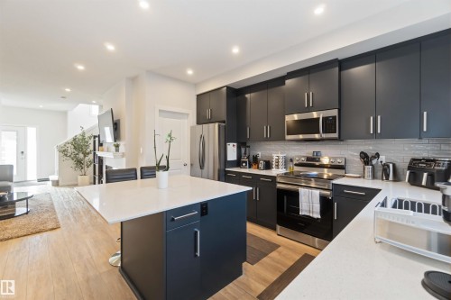 310 Balsam Link, Leduc, AB - Indoor Photo Showing Kitchen With Upgraded Kitchen