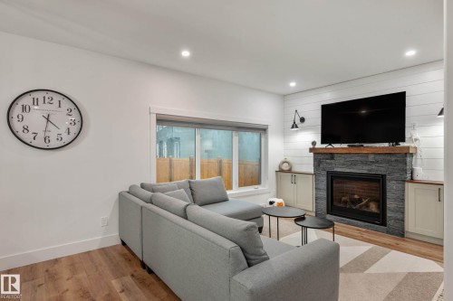 5094 Edgemont Boulevard, Edmonton, AB - Indoor Photo Showing Living Room With Fireplace
