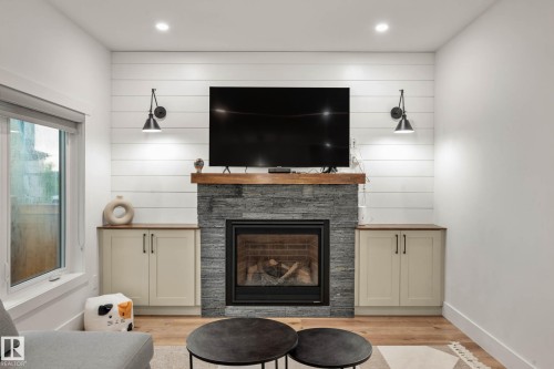 5094 Edgemont Boulevard, Edmonton, AB - Indoor Photo Showing Living Room With Fireplace