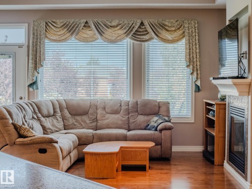 5 18343 Lessard Road, Edmonton, AB - Indoor Photo Showing Living Room With Fireplace