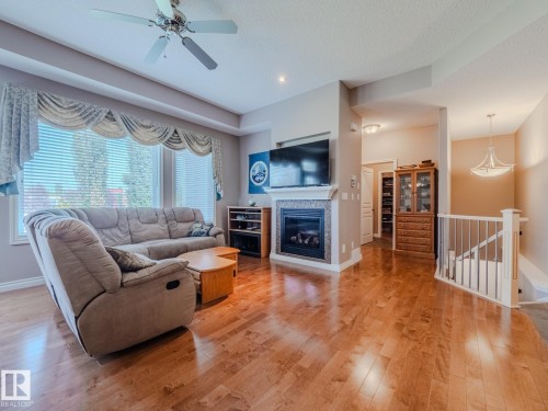 5 18343 Lessard Road, Edmonton, AB - Indoor Photo Showing Living Room With Fireplace