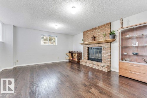 18416 77 Avenue, Edmonton, AB - Indoor Photo Showing Living Room With Fireplace
