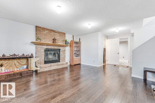 18416 77 Avenue, Edmonton, AB - Indoor Photo Showing Living Room With Fireplace