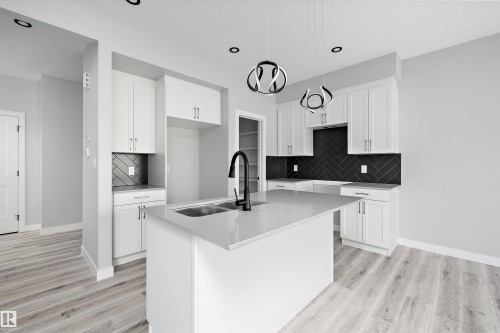 36 Maple Crescent, Gibbons, AB - Indoor Photo Showing Kitchen With Upgraded Kitchen