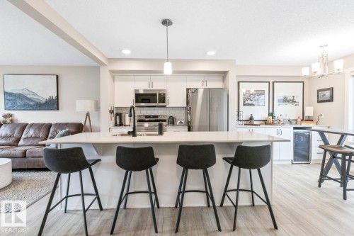 110 1530 Tamarack Boulevard, Edmonton, AB - Indoor Photo Showing Kitchen With Stainless Steel Kitchen With Upgraded Kitchen
