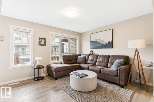 110 1530 Tamarack Boulevard, Edmonton, AB - Indoor Photo Showing Living Room