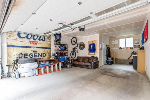 110 1530 Tamarack Boulevard, Edmonton, AB - Indoor Photo Showing Garage