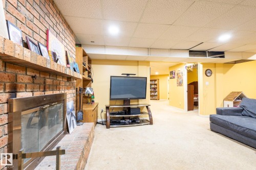 410 Olsen Close, Edmonton, AB - Indoor With Fireplace