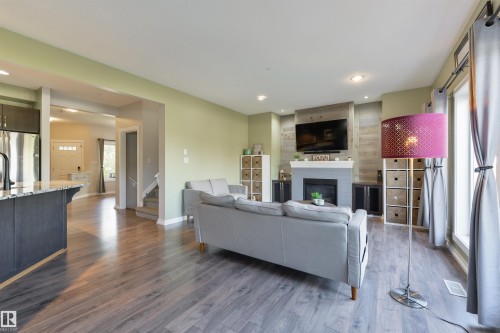 119 Brickyard Place, Stony Plain, AB - Indoor Photo Showing Other Room With Fireplace
