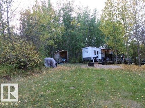 View of green lawn - #544 12002 Twp Rd 605A, Rural St. Paul County, AB 