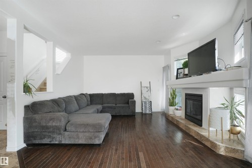 20705 56A Avenue, Edmonton, AB - Indoor Photo Showing Living Room With Fireplace