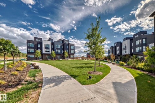 Surrounding community featuring a lawn - 68 5 Rondeau Drive, St. Albert, AB - Outdoor