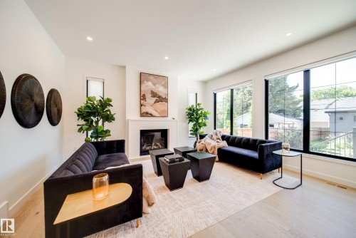 10522 134 Street, Edmonton, AB - Indoor Photo Showing Living Room With Fireplace