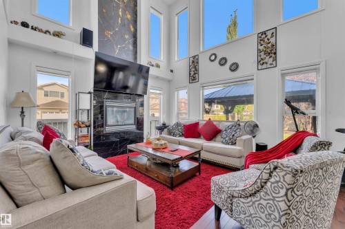 2225 32B Street, Edmonton, AB - Indoor Photo Showing Living Room With Fireplace