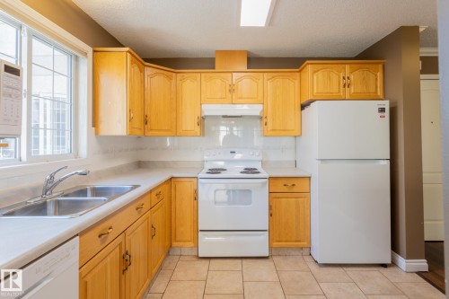 305 13450 114 Avenue, Edmonton, AB - Indoor Photo Showing Kitchen With Double Sink