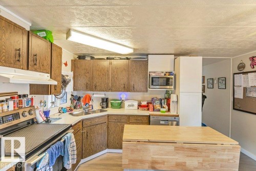 862 West Coast Bay, Edmonton, AB - Indoor Photo Showing Kitchen With Double Sink