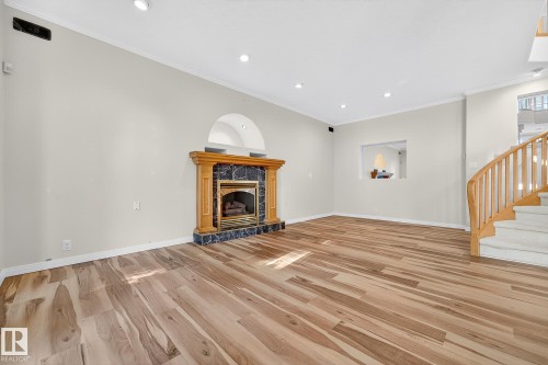 106 Farnell Close, Edmonton, AB - Indoor Photo Showing Living Room With Fireplace