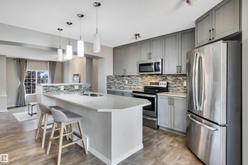 1271 Chappelle Boulevard, Edmonton, AB - Indoor Photo Showing Kitchen With Stainless Steel Kitchen With Double Sink With Upgraded Kitchen