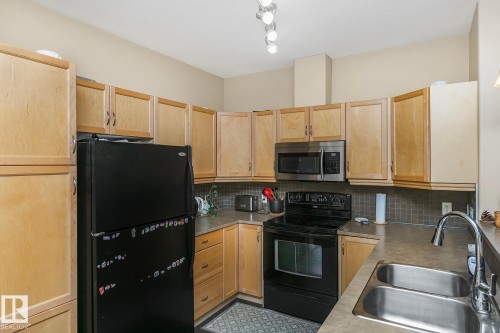 212 2503 Hanna Crescent, Edmonton, AB - Indoor Photo Showing Kitchen With Double Sink