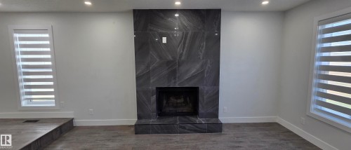 18927 95A Avenue, Edmonton, AB - Indoor Photo Showing Other Room With Fireplace