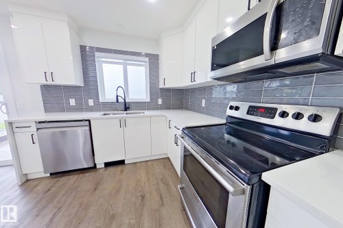 18927 95A Avenue, Edmonton, AB - Indoor Photo Showing Kitchen With Double Sink With Upgraded Kitchen