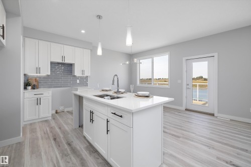 10238 92A Avenue, Morinville, AB - Indoor Photo Showing Kitchen With Double Sink With Upgraded Kitchen