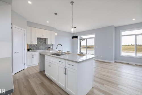 10214 92A Avenue, Morinville, AB - Indoor Photo Showing Kitchen With Double Sink With Upgraded Kitchen