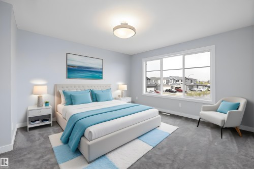 Bedroom with carpet and a residential view - 10214 92A Avenue, Morinville, AB - Indoor Photo Showing Bedroom