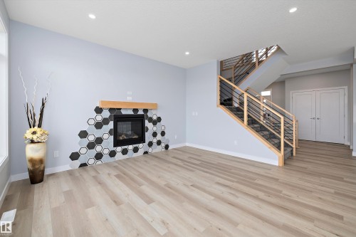 10214 92A Avenue, Morinville, AB - Indoor Photo Showing Living Room With Fireplace