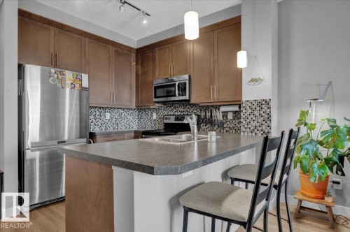 306 2588 Anderson Way, Edmonton, AB - Indoor Photo Showing Kitchen With Double Sink