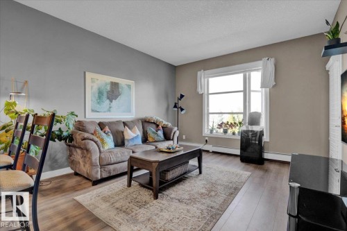 306 2588 Anderson Way, Edmonton, AB - Indoor Photo Showing Living Room